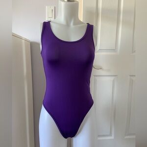 Purple one piece 💜